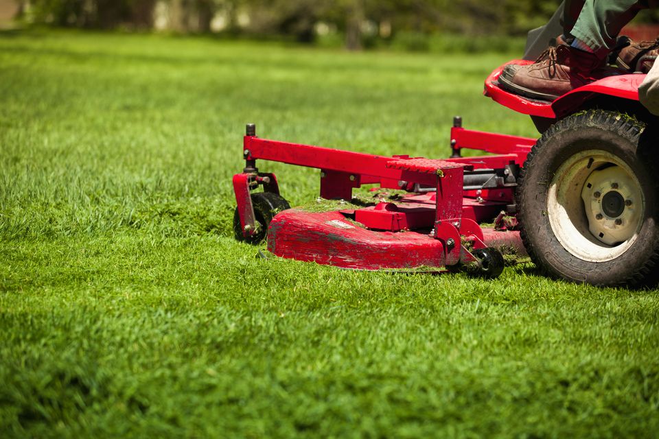 pete mowing a customers lawn